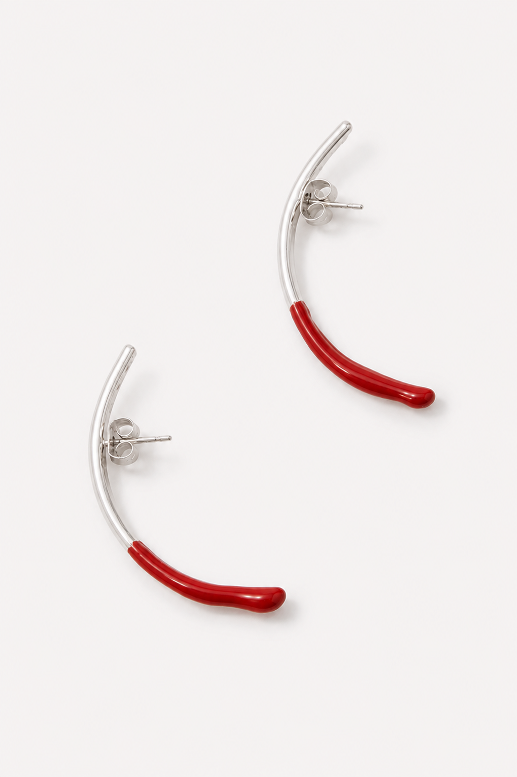 Bow earring with a hint of red