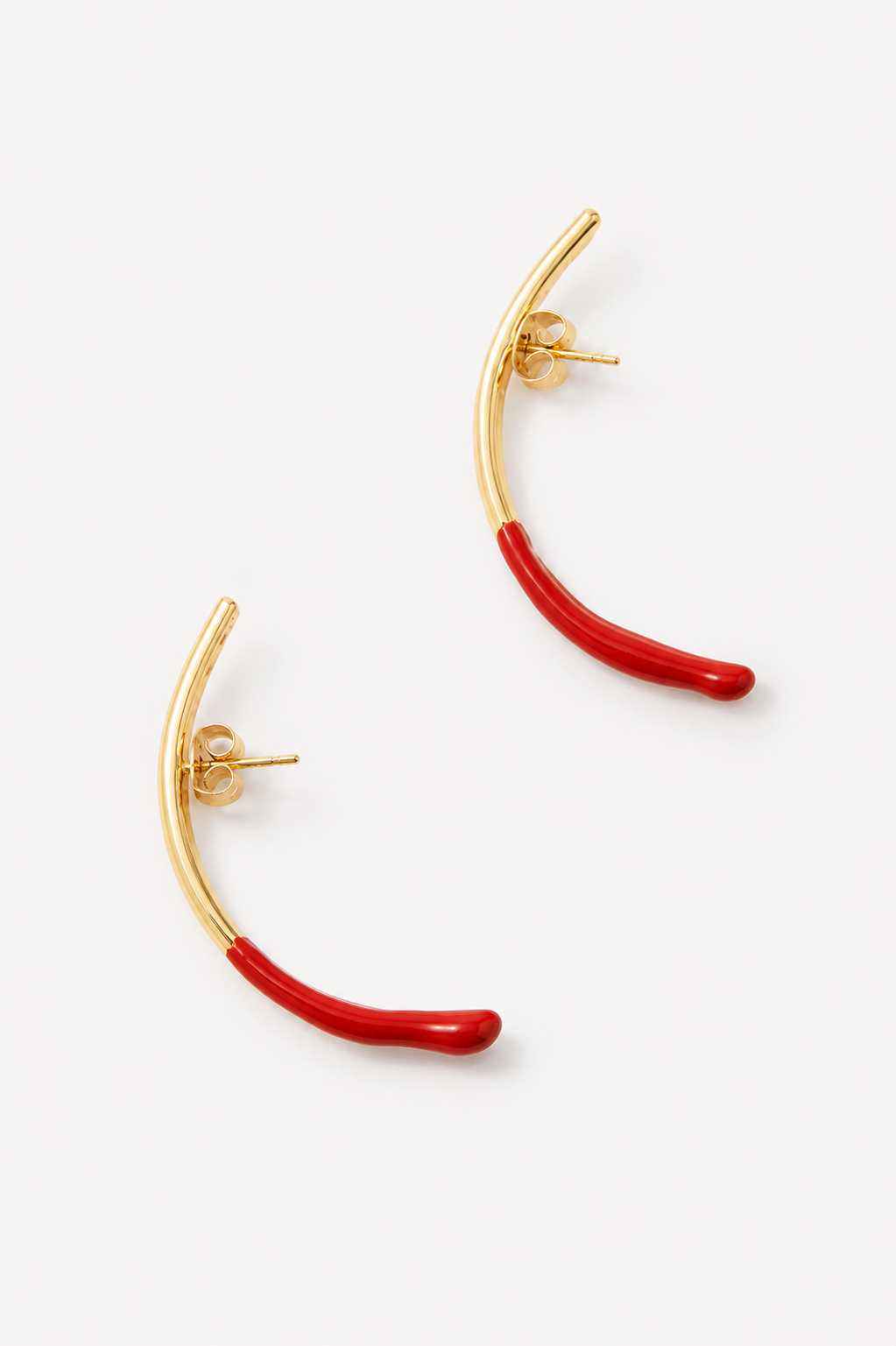 Bow earring with a hint of red