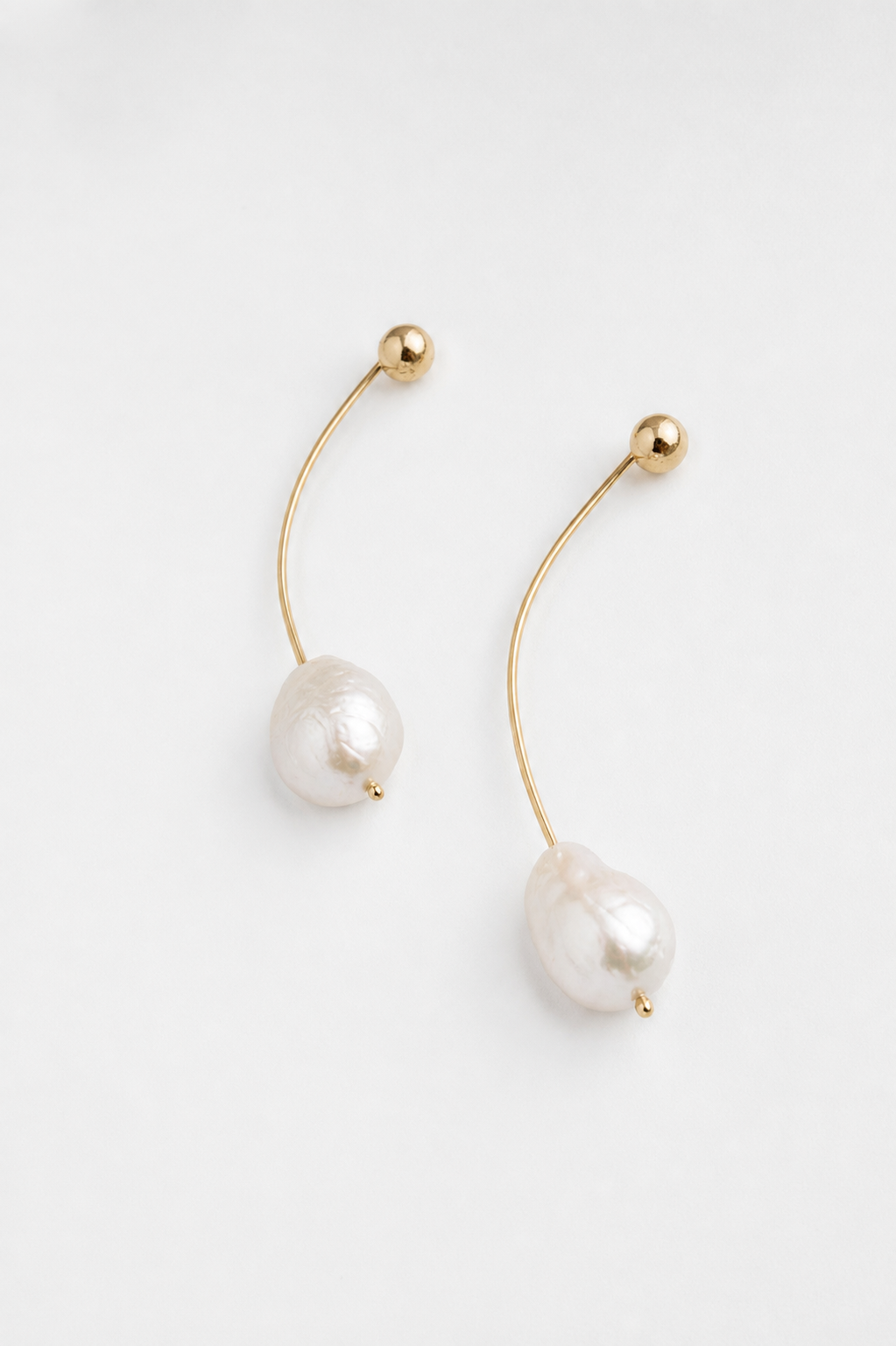 Floating pearls earring