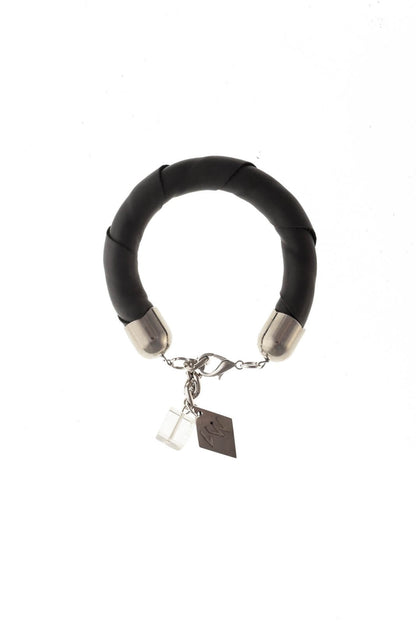 The no. 1 edition of the handcuff bracelet is made of anthracite gray leather with galvanized metal components and quartz. Silver edition.